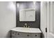 Modern bathroom featuring sleek vanity, integrated mirror lighting, and stylish fixtures at 8897 Wagner Ln, Westminster, CO 80031