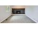 Cozy living room featuring a fireplace and neutral carpeting at 8897 Wagner Ln, Westminster, CO 80031