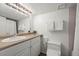 Bathroom featuring a vanity, toilet, and shower/tub combo at 4862 Silver Sage Ct, Boulder, CO 80301