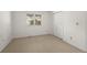 Cozy bedroom with carpet flooring, window, and closet at 4862 Silver Sage Ct, Boulder, CO 80301
