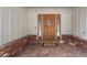 Welcoming front porch featuring a wood door with glass sidelights, brick accents, and a 'welcome' mat at 4862 Silver Sage Ct, Boulder, CO 80301