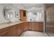 Bright bathroom featuring dual sinks, ample cabinet space, and neutral countertops, providing a functional design at 4862 Silver Sage Ct, Boulder, CO 80301