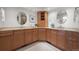 Modern bathroom featuring dual sinks, ample cabinet space, and recessed lighting, creating a spa-like experience at 4862 Silver Sage Ct, Boulder, CO 80301