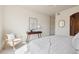 Relaxing bedroom with city views, comfortable bed, and stylish decor for a serene retreat at 1747 N Washington St # C306, Denver, CO 80203