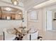 Bright dining area with an open layout providing access to the kitchen at 1747 N Washington St # C306, Denver, CO 80203