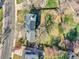 Aerial view of a home with a large backyard, shed, patio with solar panels and manicured lawns at 3766 E Easter S Cir, Centennial, CO 80122