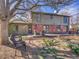 Charming backyard with a wooden patio and comfortable seating, perfect for outdoor relaxation at 3766 E Easter S Cir, Centennial, CO 80122