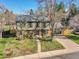 Two-story home with charming curb appeal, featuring a well-manicured front lawn and mature trees at 3766 E Easter S Cir, Centennial, CO 80122