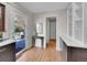 Open kitchen area leading to the outdoor deck and featuring modern cabinetry at 3766 E Easter S Cir, Centennial, CO 80122