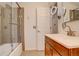 Stylish bathroom featuring tiled shower and modern vanity, blending functionality with elegant design at 2378 Hearth Dr # 6, Evergreen, CO 80439