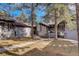 Unique condo community nestled among mature trees with landscaped grounds and walkways at 2378 Hearth Dr # 6, Evergreen, CO 80439