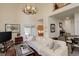 Spacious living room with high ceilings, loft, and an open floor plan at 2378 Hearth Dr # 6, Evergreen, CO 80439