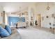 Inviting living space with an open floor plan, dining area, and staircase at 9371 Desert Willow Trl, Highlands Ranch, CO 80129