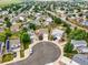 View of a neighborhood showing homes and trees surrounding a cul-de-sac at 9620 Mallard Pond Way, Littleton, CO 80125