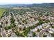 Expansive aerial view showcasing the neighborhood, surrounding community, and landscape at 9620 Mallard Pond Way, Littleton, CO 80125