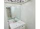 Stylish bathroom featuring a modern sink and decorative ceiling fixture at 8260 Washington St # 78, Denver, CO 80229