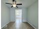 Open dining area with neutral tile floors and ceiling fan at 8260 Washington St # 78, Denver, CO 80229