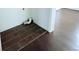 Laundry room with brown tiled floors and white walls ready for your washer and dryer hookups at 8260 Washington St # 78, Denver, CO 80229