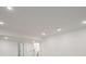 Spacious basement area with recessed lighting and white painted walls at 924 Sunflower St, Louisville, CO 80027