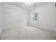Simple bedroom with carpet and a bright window at 924 Sunflower St, Louisville, CO 80027