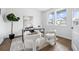 Bright home office featuring modern furniture, stylish decor, and plenty of natural light at 924 Sunflower St, Louisville, CO 80027