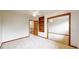 Spacious bedroom features carpet, ceiling fan, closet, and built-in shelving at 5723 S Kittredge St, Centennial, CO 80015