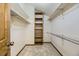 Walk-in closet featuring built-in shelves and ample storage space at 5723 S Kittredge St, Centennial, CO 80015