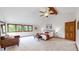 Serene main bedroom featuring vaulted ceilings, soft carpet, and ample natural light at 5723 S Kittredge St, Centennial, CO 80015