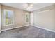 Bedroom with neutral paint, plush carpet and bright, natural light at 2154 S Parfet Dr, Lakewood, CO 80227