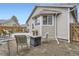 Backyard area with seating, flowers and a view of the house exterior at 8345 Moore St, Arvada, CO 80005