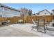 Backyard patio with comfortable outdoor seating and well-maintained landscaping at 8345 Moore St, Arvada, CO 80005