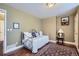 Relaxing bedroom with a daybed, decorative rug, and ample space for furniture at 8345 Moore St, Arvada, CO 80005
