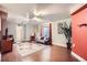 Inviting living room with hardwood floors, modern lighting, and comfortable seating area at 8345 Moore St, Arvada, CO 80005