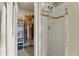 Walk-in closet with plenty of shelving, and a bright, clean shower at 3680 S Beeler St # 5, Denver, CO 80237