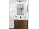 Modern bathroom with a sleek vanity and updated fixtures at 657 Newton St, Denver, CO 80204