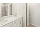 Bright bathroom with double sinks, white cabinetry and modern fixtures at 383 Remuda Rd, Berthoud, CO 80513