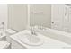 Bathroom featuring a white vanity, modern faucet, a large mirror, and sleek fixtures at 383 Remuda Rd, Berthoud, CO 80513