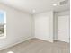 Bedroom features neutral walls, carpet, window, closet, and recessed lighting at 383 Remuda Rd, Berthoud, CO 80513