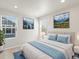 Bedroom features neutral walls, carpet, windows with views, and modern decor at 383 Remuda Rd, Berthoud, CO 80513