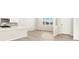 Kitchen area with hardwood flooring, stainless steel appliances and natural light at 383 Remuda Rd, Berthoud, CO 80513