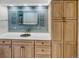 Stylish bathroom features custom cabinetry, decorative wall and backsplash tile, and a vessel sink at 4365 S Alton Way, Greenwood Village, CO 80111