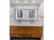 Modern bathroom with double vanity, stylish fixtures, and ample counter space at 4365 S Alton Way, Greenwood Village, CO 80111
