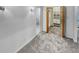 Spacious bedroom with a walk-in closet and an en-suite bathroom with custom tile and fixtures at 4365 S Alton Way, Greenwood Village, CO 80111
