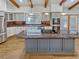 A well-equipped kitchen with granite countertops, stainless steel appliances, and custom cabinetry at 4365 S Alton Way, Greenwood Village, CO 80111