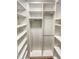 Bright, walk-in closet offers ample storage and organization for clothes and personal belongings at 4365 S Alton Way, Greenwood Village, CO 80111