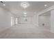 Finished basement featuring recessed lights, crystal chandeliers, neutral carpet and walk-out access at 5403 Odessa St, Denver, CO 80249