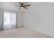Bright bedroom featuring an empty carpeted room and a window offering natural light at 5403 Odessa St, Denver, CO 80249