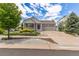 Charming single-Gathering home featuring a well-manicured lawn and two-car garage at 5403 Odessa St, Denver, CO 80249