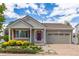 Charming single-Gathering home featuring a well-manicured lawn and two-car garage at 5403 Odessa St, Denver, CO 80249