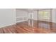 Spacious living room featuring gleaming hardwood floors, and ample natural light at 5403 Odessa St, Denver, CO 80249